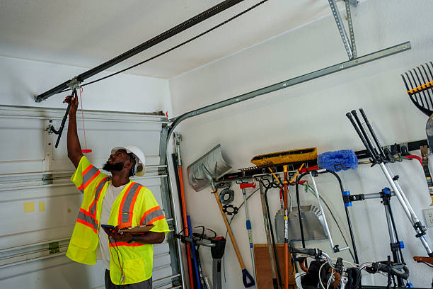 Professional Garage Door Panel Replacement technician working in Whitney Point, NY